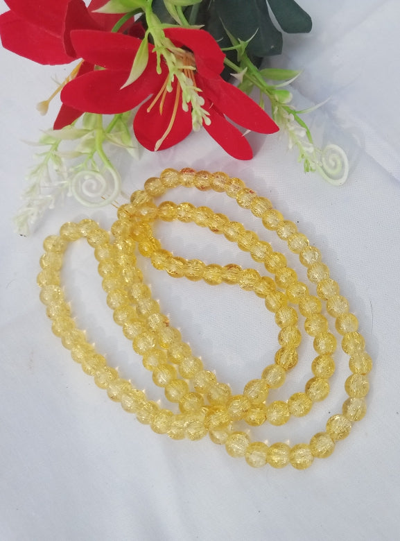 YELLOW CRACK BEADS STRING